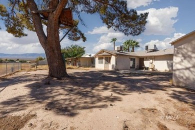 Welcome to your dream sanctuary! This one-story home has two on Coyote Willows Golf Club in Nevada - for sale on GolfHomes.com, golf home, golf lot