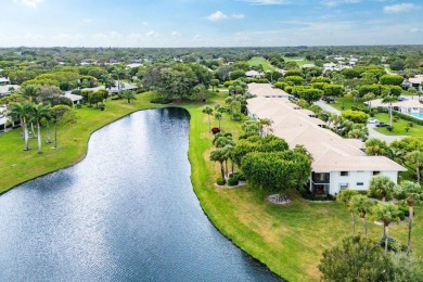 Stunning 2-Bedroom, 2-Bathroom Residence with Wrap-Around Lake on Quail Ridge Golf Course and Country Club in Florida - for sale on GolfHomes.com, golf home, golf lot