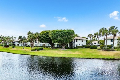 Stunning 2-Bedroom, 2-Bathroom Residence with Wrap-Around Lake on Quail Ridge Golf Course and Country Club in Florida - for sale on GolfHomes.com, golf home, golf lot