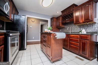 LIVE your BEST LIFE and discover this beautiful home with a view on Fairfield Plantation Golf and Country Club in Georgia - for sale on GolfHomes.com, golf home, golf lot