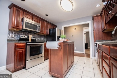 LIVE your BEST LIFE and discover this beautiful home with a view on Fairfield Plantation Golf and Country Club in Georgia - for sale on GolfHomes.com, golf home, golf lot