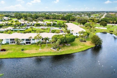 Stunning 2-Bedroom, 2-Bathroom Residence with Wrap-Around Lake on Quail Ridge Golf Course and Country Club in Florida - for sale on GolfHomes.com, golf home, golf lot