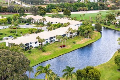 Stunning 2-Bedroom, 2-Bathroom Residence with Wrap-Around Lake on Quail Ridge Golf Course and Country Club in Florida - for sale on GolfHomes.com, golf home, golf lot