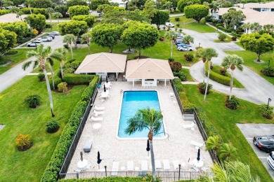 Stunning 2-Bedroom, 2-Bathroom Residence with Wrap-Around Lake on Quail Ridge Golf Course and Country Club in Florida - for sale on GolfHomes.com, golf home, golf lot