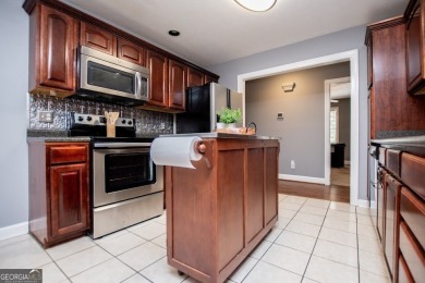 LIVE your BEST LIFE and discover this beautiful home with a view on Fairfield Plantation Golf and Country Club in Georgia - for sale on GolfHomes.com, golf home, golf lot