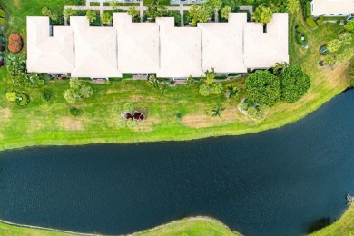 Stunning 2-Bedroom, 2-Bathroom Residence with Wrap-Around Lake on Quail Ridge Golf Course and Country Club in Florida - for sale on GolfHomes.com, golf home, golf lot