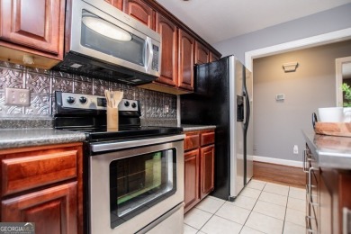 LIVE your BEST LIFE and discover this beautiful home with a view on Fairfield Plantation Golf and Country Club in Georgia - for sale on GolfHomes.com, golf home, golf lot