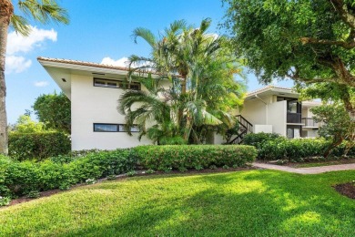 Stunning 2-Bedroom, 2-Bathroom Residence with Wrap-Around Lake on Quail Ridge Golf Course and Country Club in Florida - for sale on GolfHomes.com, golf home, golf lot