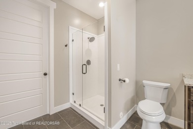 This stunning custom-built home sits on a generous lot right on on Star Valley RV Golf Course in Wyoming - for sale on GolfHomes.com, golf home, golf lot