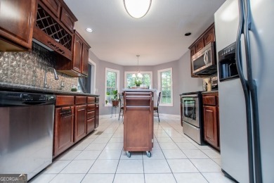 LIVE your BEST LIFE and discover this beautiful home with a view on Fairfield Plantation Golf and Country Club in Georgia - for sale on GolfHomes.com, golf home, golf lot