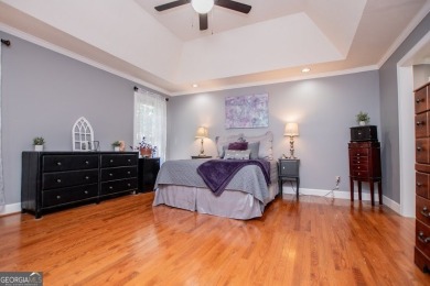 LIVE your BEST LIFE and discover this beautiful home with a view on Fairfield Plantation Golf and Country Club in Georgia - for sale on GolfHomes.com, golf home, golf lot