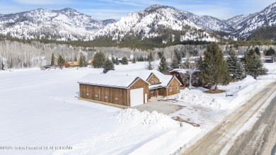 This stunning custom-built home sits on a generous lot right on on Star Valley RV Golf Course in Wyoming - for sale on GolfHomes.com, golf home, golf lot