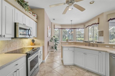 Discover timeless Florida living in this Nisley-built Bermuda on Calusa Lakes Golf Club in Florida - for sale on GolfHomes.com, golf home, golf lot