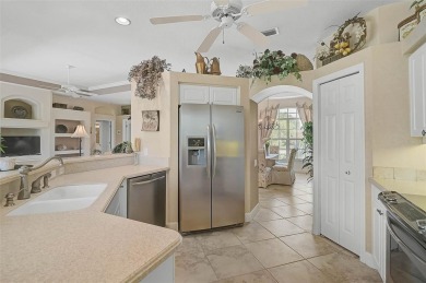 Discover timeless Florida living in this Nisley-built Bermuda on Calusa Lakes Golf Club in Florida - for sale on GolfHomes.com, golf home, golf lot