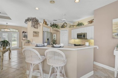 Discover timeless Florida living in this Nisley-built Bermuda on Calusa Lakes Golf Club in Florida - for sale on GolfHomes.com, golf home, golf lot
