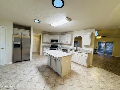 Welcome home to the quaint coastal community of Carolina Shores on Carolina Shores Golf Course in North Carolina - for sale on GolfHomes.com, golf home, golf lot