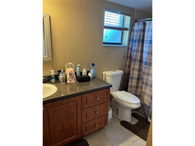 Don't miss this incredible opportunity to own a spacious on Sunrise Lakes Phase IV Golf Course in Florida - for sale on GolfHomes.com, golf home, golf lot