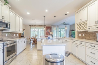 Experience RESORT STYLE Living in the sought after 55+ Community on Tampa Bay Golf and Country Club in Florida - for sale on GolfHomes.com, golf home, golf lot