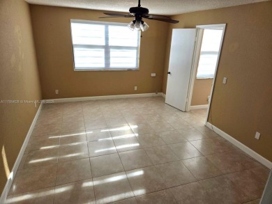 Don't miss this incredible opportunity to own a spacious on Sunrise Lakes Phase IV Golf Course in Florida - for sale on GolfHomes.com, golf home, golf lot