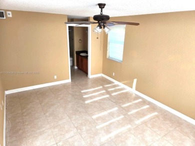 Don't miss this incredible opportunity to own a spacious on Sunrise Lakes Phase IV Golf Course in Florida - for sale on GolfHomes.com, golf home, golf lot