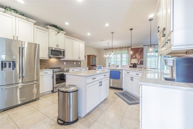 Experience RESORT STYLE Living in the sought after 55+ Community on Tampa Bay Golf and Country Club in Florida - for sale on GolfHomes.com, golf home, golf lot