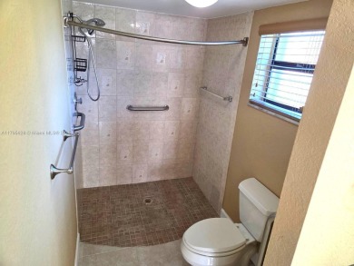 Don't miss this incredible opportunity to own a spacious on Sunrise Lakes Phase IV Golf Course in Florida - for sale on GolfHomes.com, golf home, golf lot