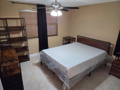 Don't miss this incredible opportunity to own a spacious on Sunrise Lakes Phase IV Golf Course in Florida - for sale on GolfHomes.com, golf home, golf lot