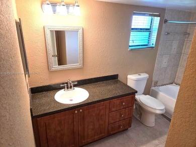Don't miss this incredible opportunity to own a spacious on Sunrise Lakes Phase IV Golf Course in Florida - for sale on GolfHomes.com, golf home, golf lot