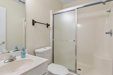 Welcome home to the quaint coastal community of Carolina Shores on Carolina Shores Golf Course in North Carolina - for sale on GolfHomes.com, golf home, golf lot