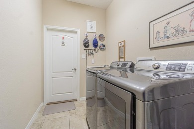 Experience RESORT STYLE Living in the sought after 55+ Community on Tampa Bay Golf and Country Club in Florida - for sale on GolfHomes.com, golf home, golf lot