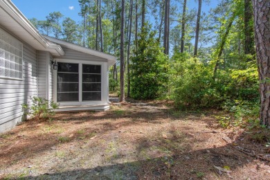 Welcome home to the quaint coastal community of Carolina Shores on Carolina Shores Golf Course in North Carolina - for sale on GolfHomes.com, golf home, golf lot