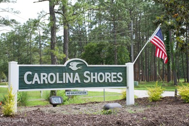 Welcome home to the quaint coastal community of Carolina Shores on Carolina Shores Golf Course in North Carolina - for sale on GolfHomes.com, golf home, golf lot