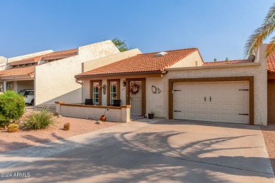 Discover this end-unit townhome in Camelot Country Club Estates! on Painted Mountain Golf Club in Arizona - for sale on GolfHomes.com, golf home, golf lot