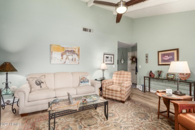 Discover this end-unit townhome in Camelot Country Club Estates! on Painted Mountain Golf Club in Arizona - for sale on GolfHomes.com, golf home, golf lot