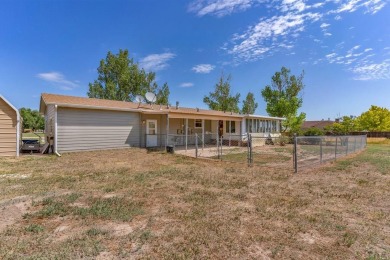 Don't miss out on this well-maintained home located in beautiful on Hollydot Golf Course in Colorado - for sale on GolfHomes.com, golf home, golf lot