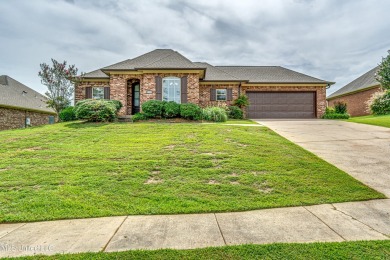 812 Willow Grande Cir in the Willows of Castlewoods is in a USDA on Castlewoods Golf Club in Mississippi - for sale on GolfHomes.com, golf home, golf lot