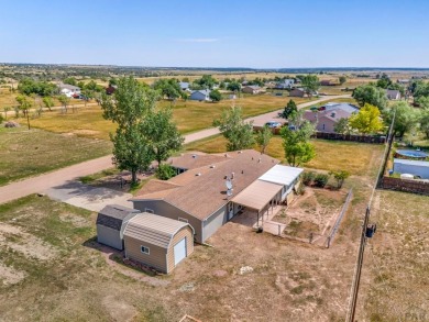 Don't miss out on this well-maintained home located in beautiful on Hollydot Golf Course in Colorado - for sale on GolfHomes.com, golf home, golf lot