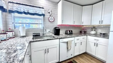 Welcome to this beautifully updated 2-bedroom, 2-bath on Riverbend Golf and Country Club in Florida - for sale on GolfHomes.com, golf home, golf lot