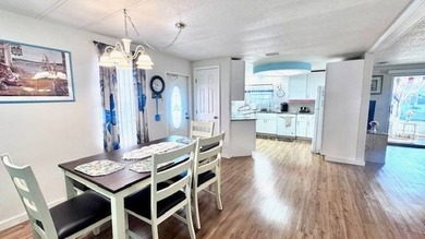 Welcome to this beautifully updated 2-bedroom, 2-bath on Riverbend Golf and Country Club in Florida - for sale on GolfHomes.com, golf home, golf lot