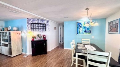 Welcome to this beautifully updated 2-bedroom, 2-bath on Riverbend Golf and Country Club in Florida - for sale on GolfHomes.com, golf home, golf lot