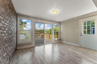 This 2 BED 3 BATH 2000 sq ft RANCH home is nestled  on a wooded on Lakes of the Four Seasons Country Club in Indiana - for sale on GolfHomes.com, golf home, golf lot