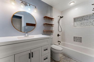 This 2 BED 3 BATH 2000 sq ft RANCH home is nestled  on a wooded on Lakes of the Four Seasons Country Club in Indiana - for sale on GolfHomes.com, golf home, golf lot
