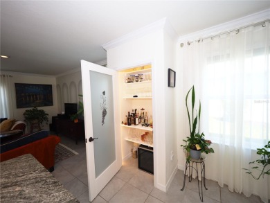 This spacious two story home all-concrete block construction has on Esplanade Golf and Country at Lakewood Ranch in Florida - for sale on GolfHomes.com, golf home, golf lot