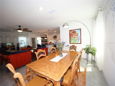 This spacious two story home all-concrete block construction has on Esplanade Golf and Country at Lakewood Ranch in Florida - for sale on GolfHomes.com, golf home, golf lot