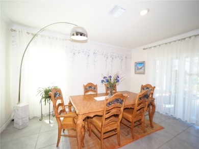 This spacious two story home all-concrete block construction has on Esplanade Golf and Country at Lakewood Ranch in Florida - for sale on GolfHomes.com, golf home, golf lot