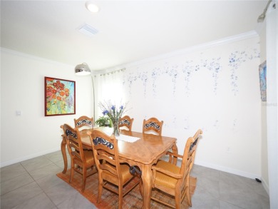 This spacious two story home all-concrete block construction has on Esplanade Golf and Country at Lakewood Ranch in Florida - for sale on GolfHomes.com, golf home, golf lot