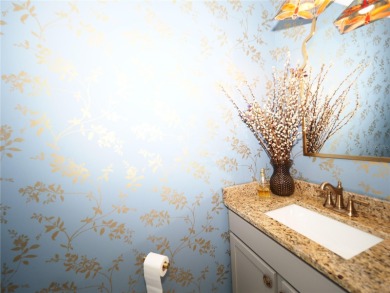 This spacious two story home all-concrete block construction has on Esplanade Golf and Country at Lakewood Ranch in Florida - for sale on GolfHomes.com, golf home, golf lot