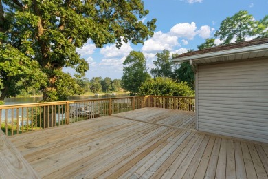 This 2 BED 3 BATH 2000 sq ft RANCH home is nestled  on a wooded on Lakes of the Four Seasons Country Club in Indiana - for sale on GolfHomes.com, golf home, golf lot
