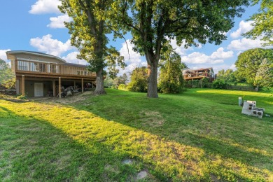 This 2 BED 3 BATH 2000 sq ft RANCH home is nestled  on a wooded on Lakes of the Four Seasons Country Club in Indiana - for sale on GolfHomes.com, golf home, golf lot