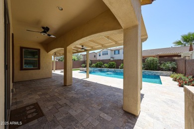 Welcome to your Oasis in the Desert! Upon arrival, you will find on Estrella Mountain Ranch Golf Course in Arizona - for sale on GolfHomes.com, golf home, golf lot